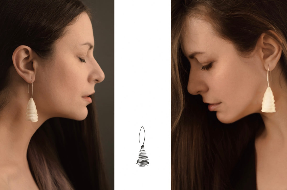 A diptych featuring two women with closed eyes wearing the ‘Tornado’ porcelain earring by Serhiy Verbicki, symbolizing harmony and reflection, with a central earring sketch.
